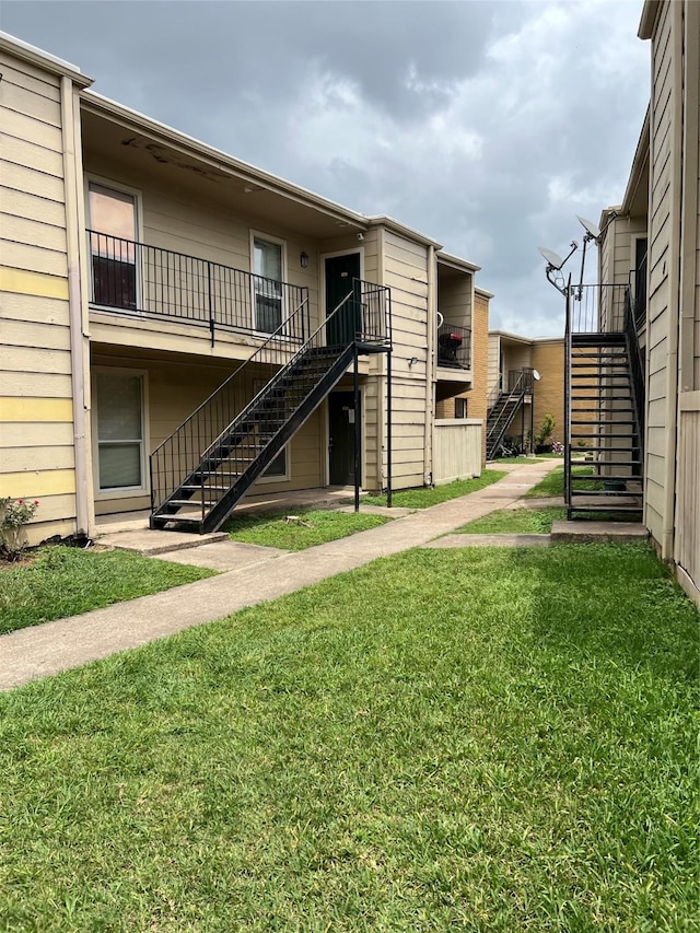 view of property featuring stairs