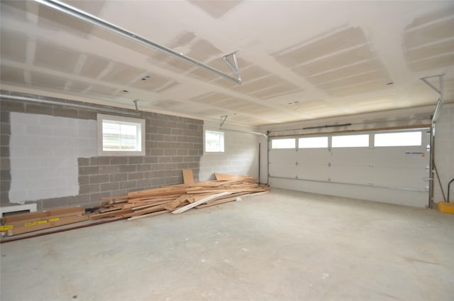 garage with concrete block wall