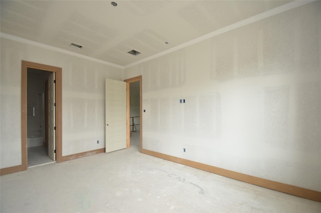 empty room featuring baseboards, ornamental molding, and visible vents