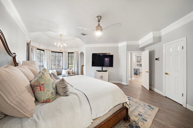 32743 Weybridge St, Fulshear, TX 77441 - bedroom featuring ornamental molding, wood finished floors, a chandelier, and ceiling fan