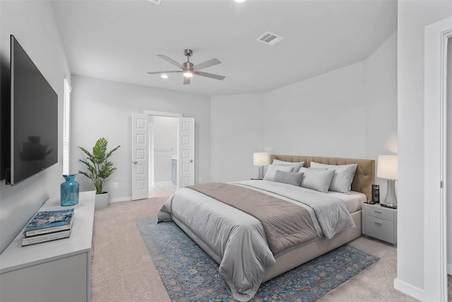 bedroom with ceiling fan, visible vents, baseboards, light carpet, and recessed lighting