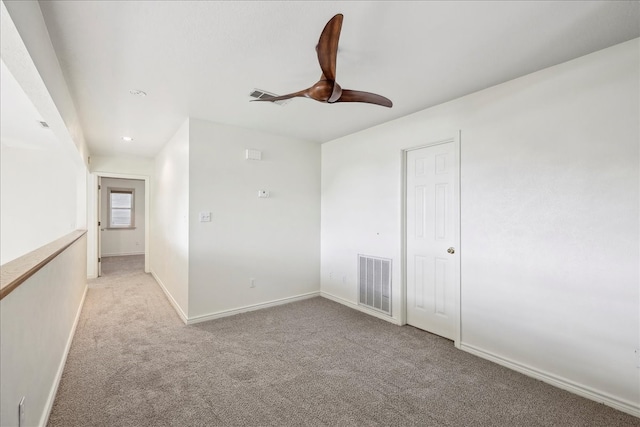 3139 Fm 1406, Winnie, TX 77665 - empty room with baseboards, ceiling fan, light colored carpet, and visible vents