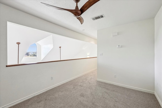 3139 Fm 1406, Winnie, TX 77665 - empty room featuring carpet floors, a ceiling fan, baseboards, and visible vents