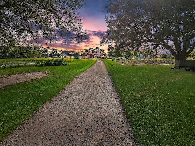 3139 Fm 1406, Winnie, TX 77665 - view of property's community with a lawn