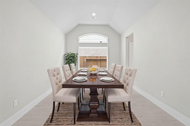 23415 Persimmon Creek Ln, Katy, TX 77493 - dining area with wood finished floors and lofted ceiling