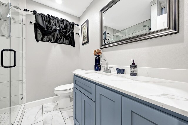 bathroom with baseboards, a stall shower, toilet, and marble finish floor