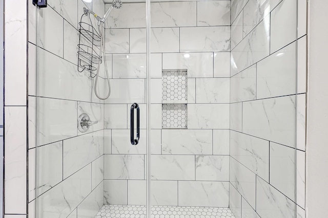 full bathroom with a shower stall