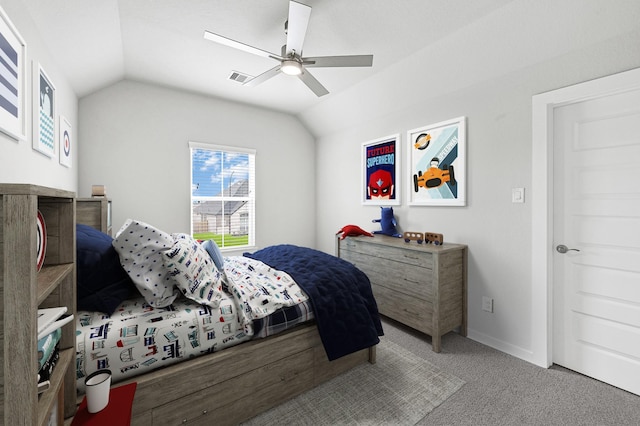 bedroom with a ceiling fan, baseboards, visible vents, and lofted ceiling