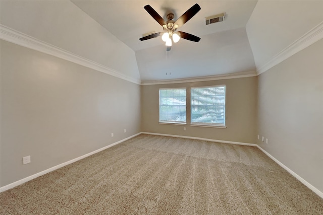 carpeted empty room featuring visible vents, a ceiling fan, baseboards, and lofted ceiling