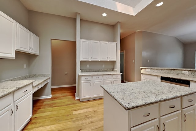 kitchen featuring light wood-style floors, recessed lighting, and white cabinetry
