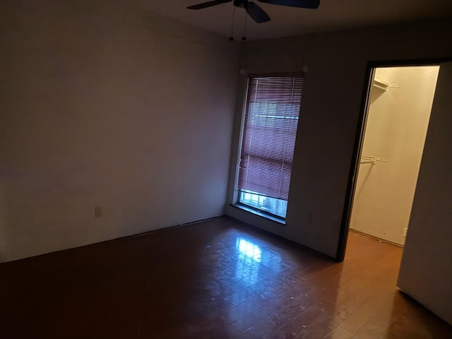 empty room with a ceiling fan