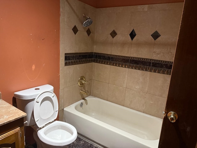 bathroom with toilet, shower / tub combination, and vanity