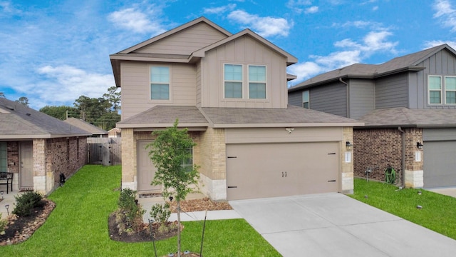 22619 Goose Pasture Ln, Spring, TX 77373 - view of front of home featuring board and batten siding, driveway, a front yard, an attached garage, and stone siding