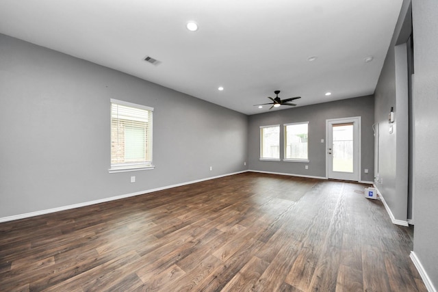 22619 Goose Pasture Ln, Spring, TX 77373 - empty room featuring a ceiling fan, dark wood-type flooring, and recessed lighting