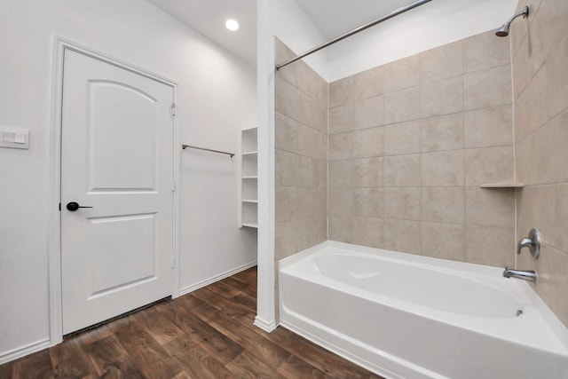 22619 Goose Pasture Ln, Spring, TX 77373 - bathroom with tub / shower combination, wood finished floors, and recessed lighting