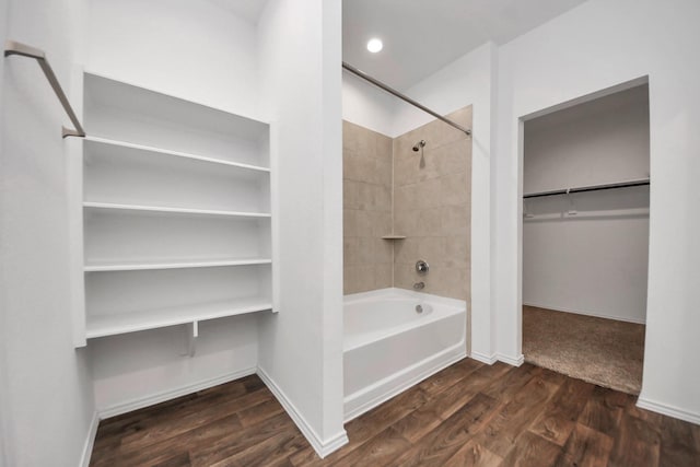 22619 Goose Pasture Ln, Spring, TX 77373 - bathroom with shower / washtub combination, a spacious closet, and wood finished floors