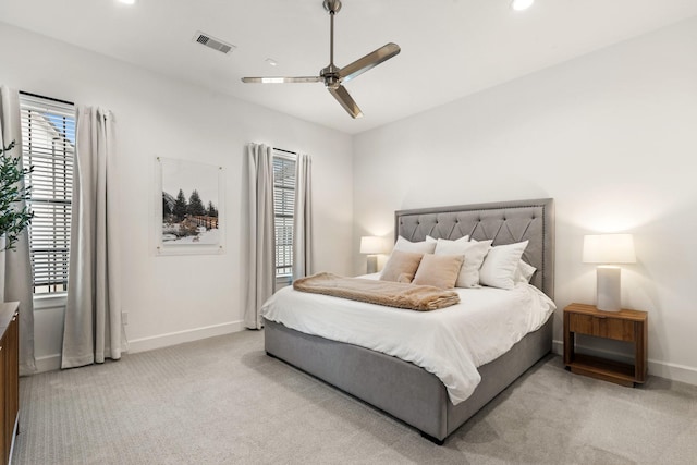 bedroom with visible vents, light carpet, baseboards, recessed lighting, and a ceiling fan