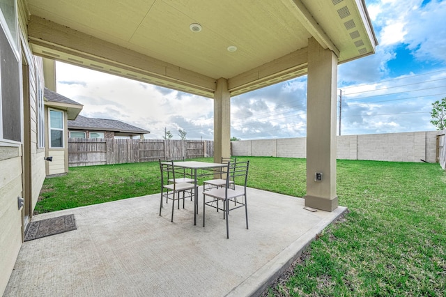 view of patio / terrace with outdoor dining area and a fenced backyard