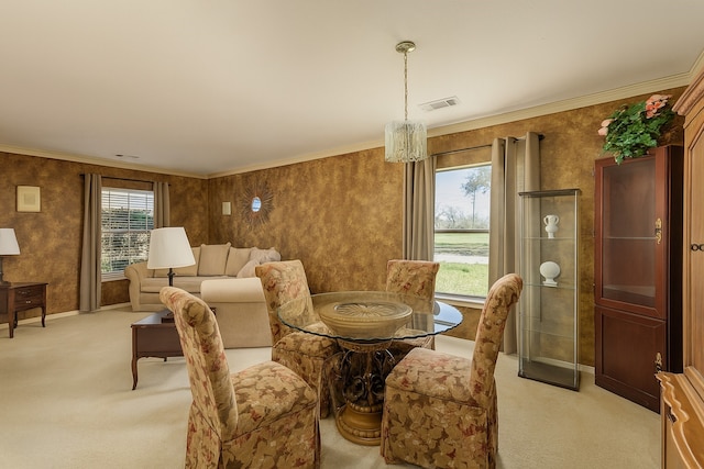 2103 Laurel Arbor Dr, Houston, TX 77014 - dining space with light colored carpet, a chandelier, and crown molding