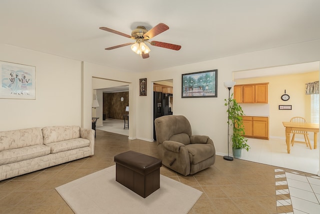 2103 Laurel Arbor Dr, Houston, TX 77014 - living room with light tile patterned floors and ceiling fan