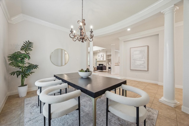 5638 Ballina Canyon Ln, Houston, TX 77041 - dining room featuring decorative columns, light tile patterned floors, a chandelier, ornamental molding, and baseboards