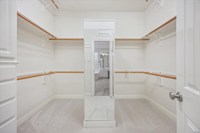 5638 Ballina Canyon Ln, Houston, TX 77041 - spacious closet featuring carpet