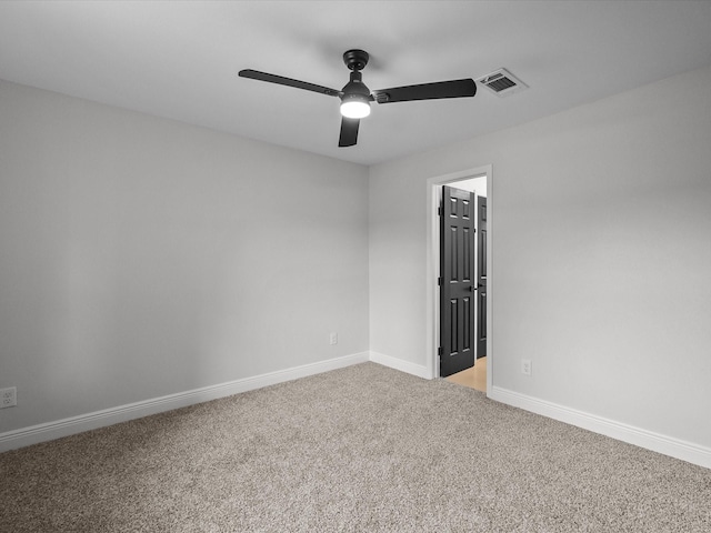 5225 Main St, Santa Fe, TX 77510 - unfurnished room with visible vents, baseboards, ceiling fan, and light carpet