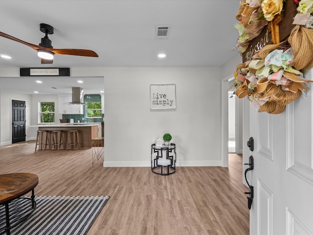 5225 Main St, Santa Fe, TX 77510 - entryway with recessed lighting, baseboards, visible vents, and light wood finished floors
