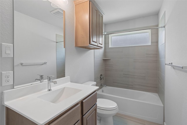 1904 Golden Spruce Ln, Conroe, TX 77301 - bathroom with vanity, shower / bathtub combination, visible vents, and toilet