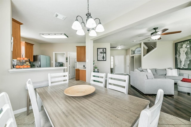 9322 Colt Canyon Ln, Houston, TX 77089 - dining room with a chandelier and ceiling fan