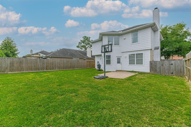 9322 Colt Canyon Ln, Houston, TX 77089 - back of property with a patio, a fenced backyard, and a chimney