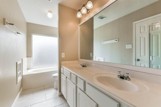 9322 Colt Canyon Ln, Houston, TX 77089 - full bathroom featuring double vanity, a garden tub, and tile patterned floors
