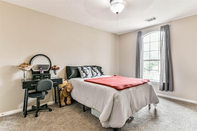 9322 Colt Canyon Ln, Houston, TX 77089 - carpeted bedroom featuring baseboards and ceiling fan
