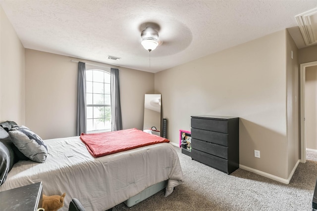 9322 Colt Canyon Ln, Houston, TX 77089 - bedroom with a textured ceiling, carpet, attic access, and ceiling fan
