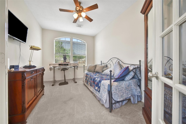 bedroom featuring ceiling fan, light carpet, french doors, baseboards, and visible vents