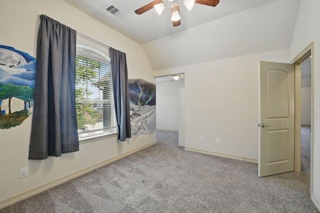 23 Castello Ln, Missouri City, TX 77459 - unfurnished bedroom with carpet floors, baseboards, lofted ceiling, and visible vents