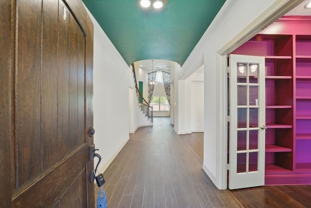 23 Castello Ln, Missouri City, TX 77459 - interior space with baseboards, wood finished floors, and stairway