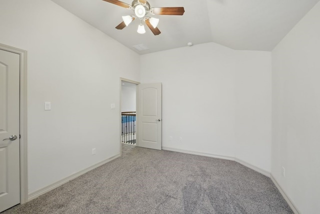 23 Castello Ln, Missouri City, TX 77459 - unfurnished bedroom with carpet flooring, a ceiling fan, baseboards, and vaulted ceiling