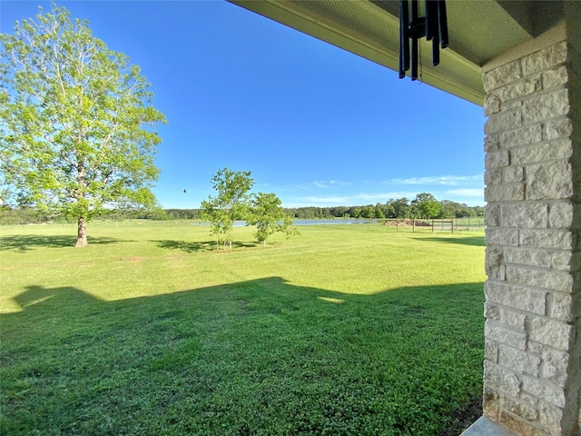view of yard with a water view