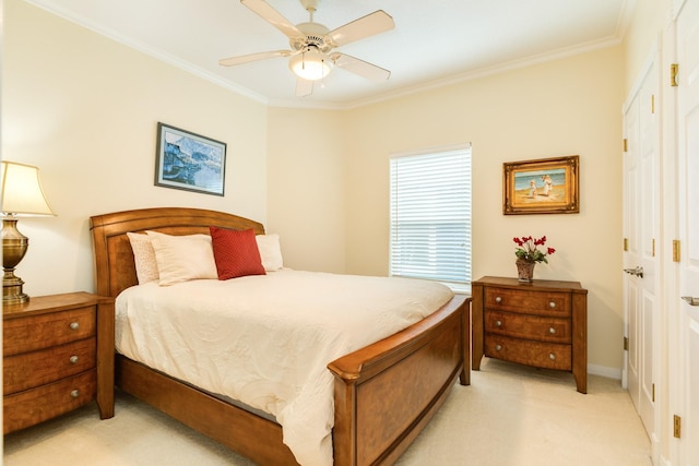 2330 Blue Water Hwy, Surfside Beach, TX 77541 - bedroom featuring a closet, ornamental molding, ceiling fan, and light carpet