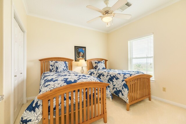 2330 Blue Water Hwy, Surfside Beach, TX 77541 - bedroom with baseboards, ornamental molding, carpet, and visible vents