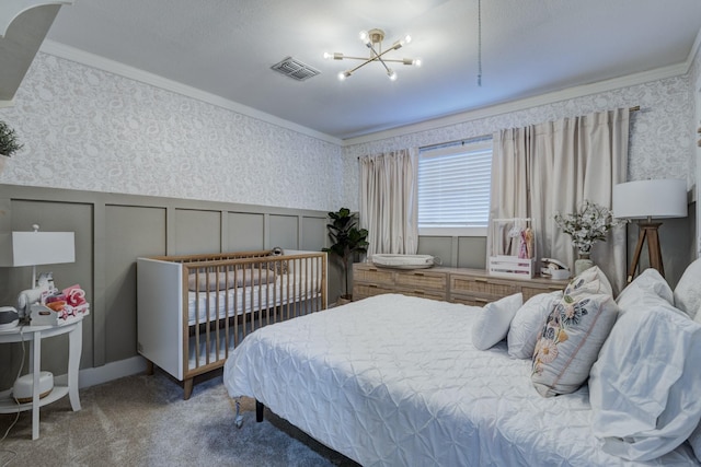 10503 Metronome Dr, Houston, TX 77043 - bedroom featuring crown molding, carpet, a notable chandelier, and wallpapered walls