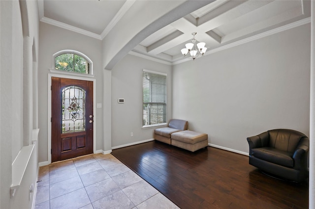10418 Texas Sage Way, Cypress, TX 77433 - foyer with a chandelier, coffered ceiling, beam ceiling, crown molding, and hardwood / wood-style floors