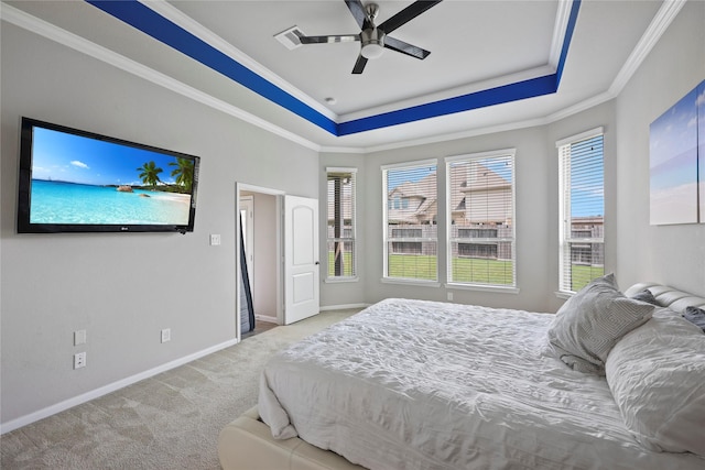 10418 Texas Sage Way, Cypress, TX 77433 - carpeted bedroom featuring a tray ceiling, crown molding, and a ceiling fan