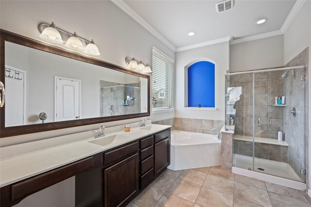 full bathroom featuring double vanity, a bath, visible vents, a sink, and ornamental molding