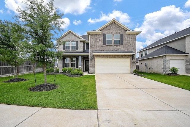view of front of property with fence, an attached garage, a front lawn, brick siding, and concrete driveway