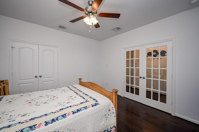 bedroom with visible vents, a closet, wood finished floors, and french doors