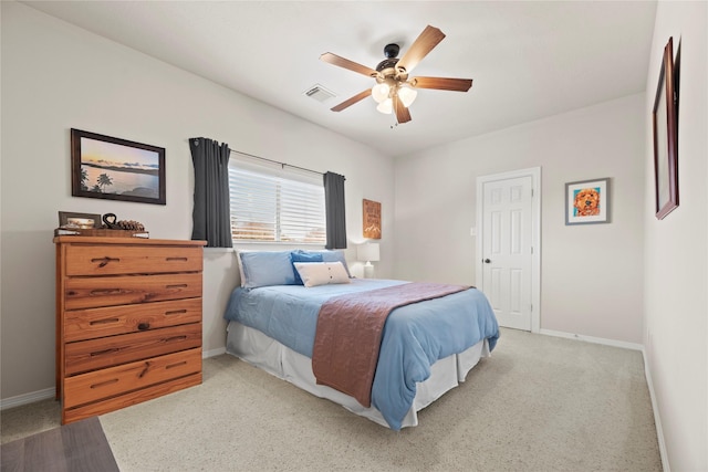 17714 W Copper Lakes Dr, Houston, TX 77095 - bedroom with visible vents, baseboards, ceiling fan, and light carpet