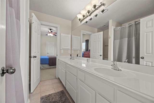 17714 W Copper Lakes Dr, Houston, TX 77095 - ensuite bathroom featuring a sink, visible vents, double vanity, and connected bathroom