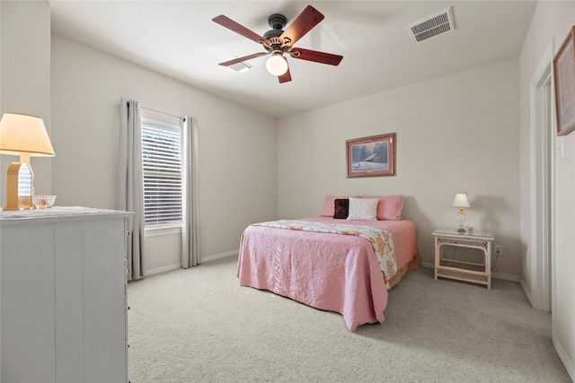 17714 W Copper Lakes Dr, Houston, TX 77095 - bedroom with a ceiling fan, baseboards, visible vents, and light carpet